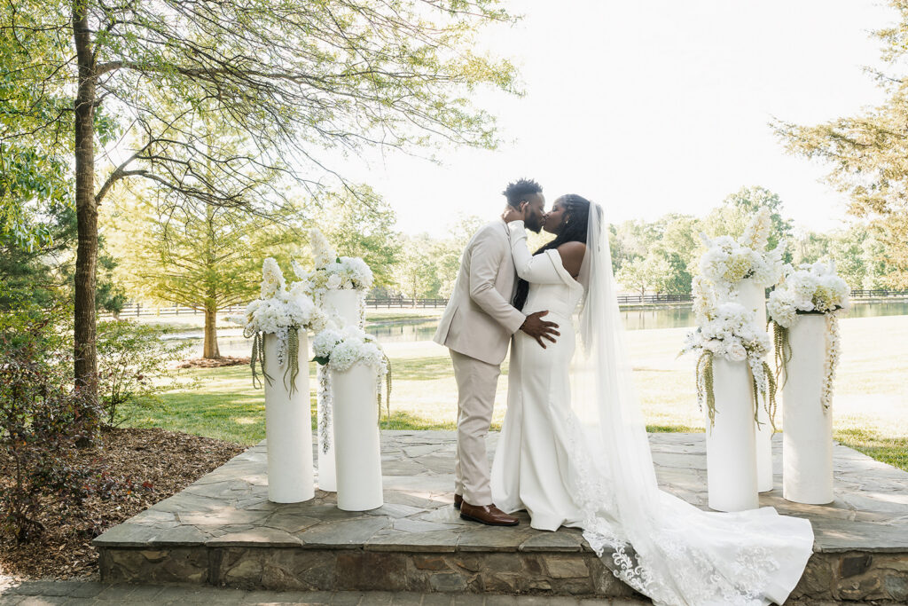 cute picture of the bride and groom kissing